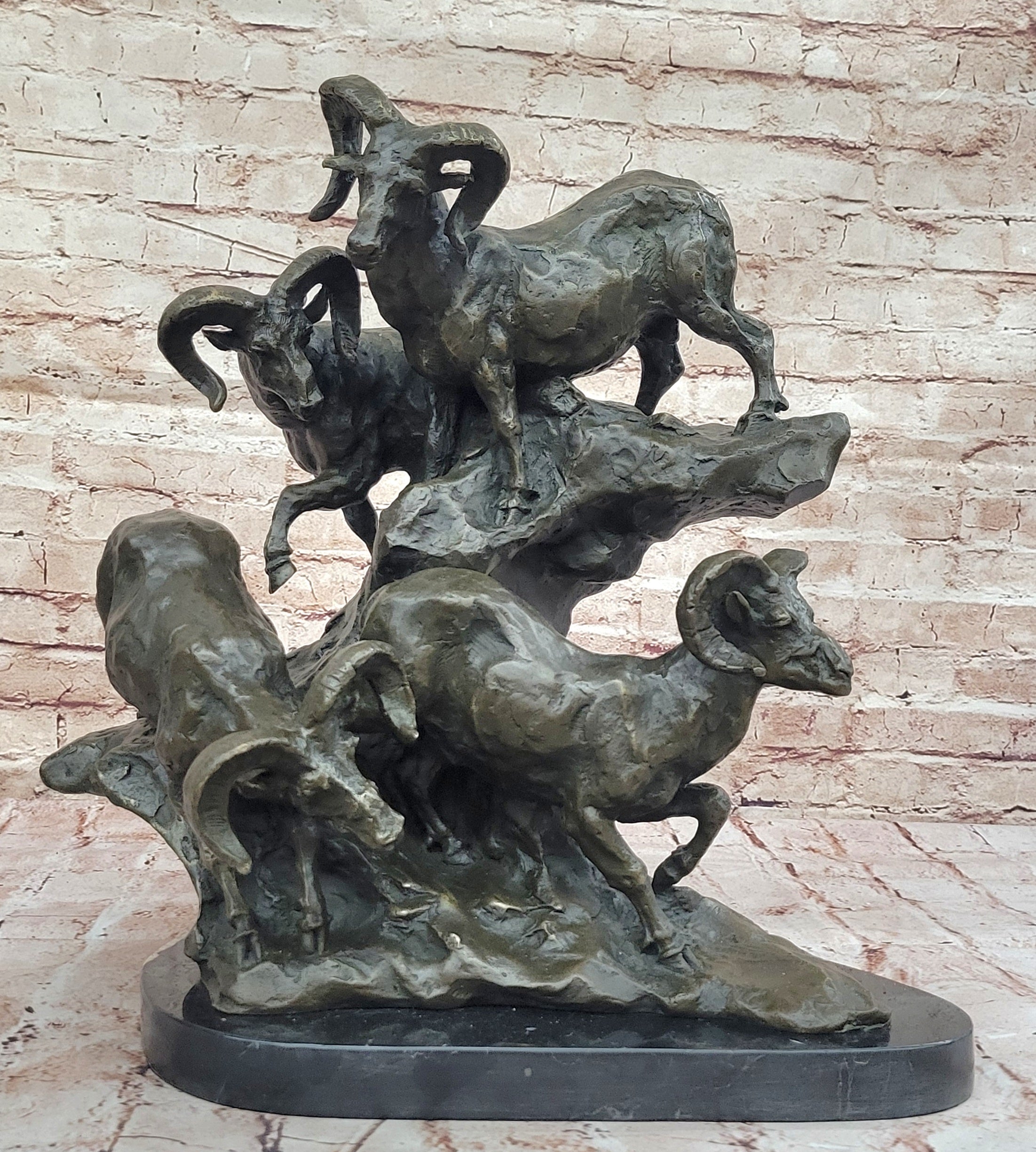 Bronze Sculpture of Rams on Rocky Outcrop – Wildlife Scene