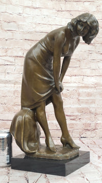 Bronze Sculpture of Woman Adjusting Dress on Marble Base