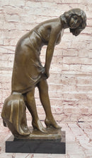 Bronze Sculpture of Woman Adjusting Dress on Marble Base
