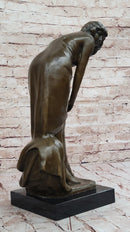 Bronze Sculpture of Woman Adjusting Dress on Marble Base