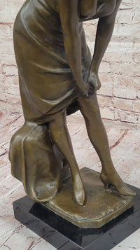 Bronze Sculpture of Woman Adjusting Dress on Marble Base