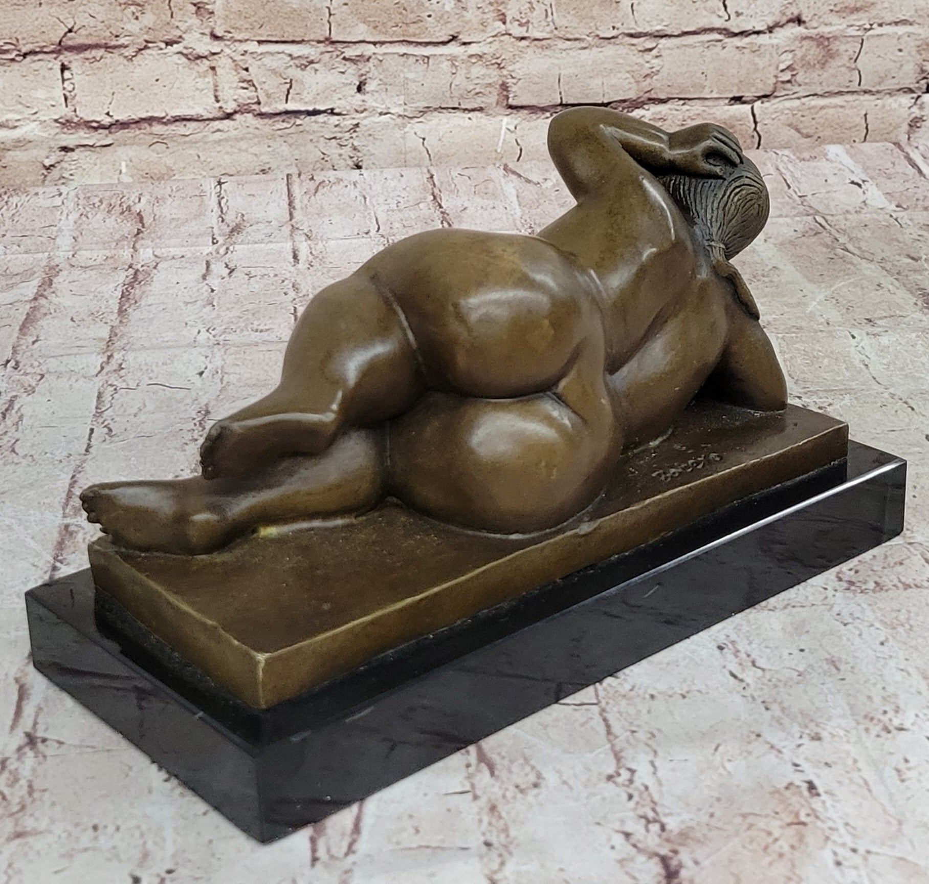 Chubby Nude Woman Laying on Her Side - Bronze Sculpture by Fernando Botero