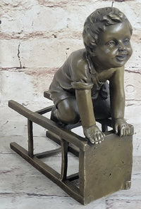 Baby Toddler Child Playing on Stool Bronze Metal Sculpture