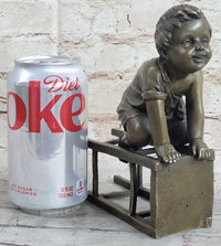 Baby Toddler Child Playing on Stool Bronze Metal Sculpture