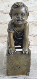 Baby Toddler Child Playing on Stool Bronze Metal Sculpture