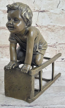 Baby Toddler Child Playing on Stool Bronze Metal Sculpture