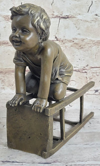 Baby Toddler Child Playing on Stool Bronze Metal Sculpture