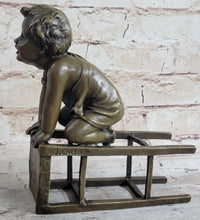 Baby Toddler Child Playing on Stool Bronze Metal Sculpture