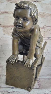 Baby Toddler Child Playing on Stool Bronze Metal Sculpture