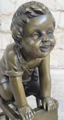Baby Toddler Child Playing on Stool Bronze Metal Sculpture