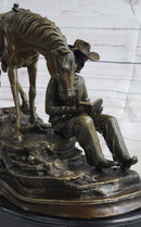 Cowboy Reading Book with Horse Bronze Sculpture 11" x 13"