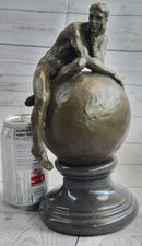 Nude Male Figure Resting on Globe Sculpture Figure Signed 11" x 7"