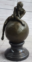 Nude Male Figure Resting on Globe Sculpture Figure Signed 11" x 7"