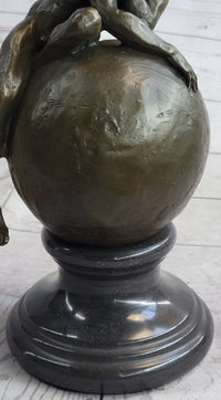 Nude Male Figure Resting on Globe Sculpture Figure Signed 11" x 7"