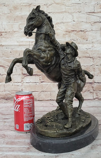 Bronze Cowboy Taming Rearing Horse – Western Art