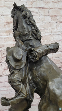 Bronze Cowboy Taming Rearing Horse – Western Art