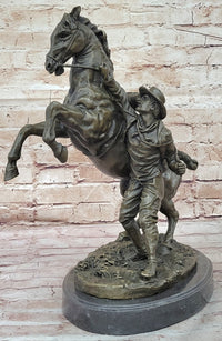 Bronze Cowboy Taming Rearing Horse – Western Art