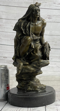 Native American Indian Warrior Squatting on Rock Bronze Sculpture