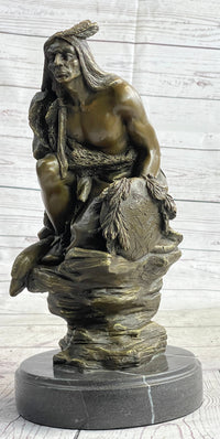 Native American Indian Warrior Squatting on Rock Bronze Sculpture