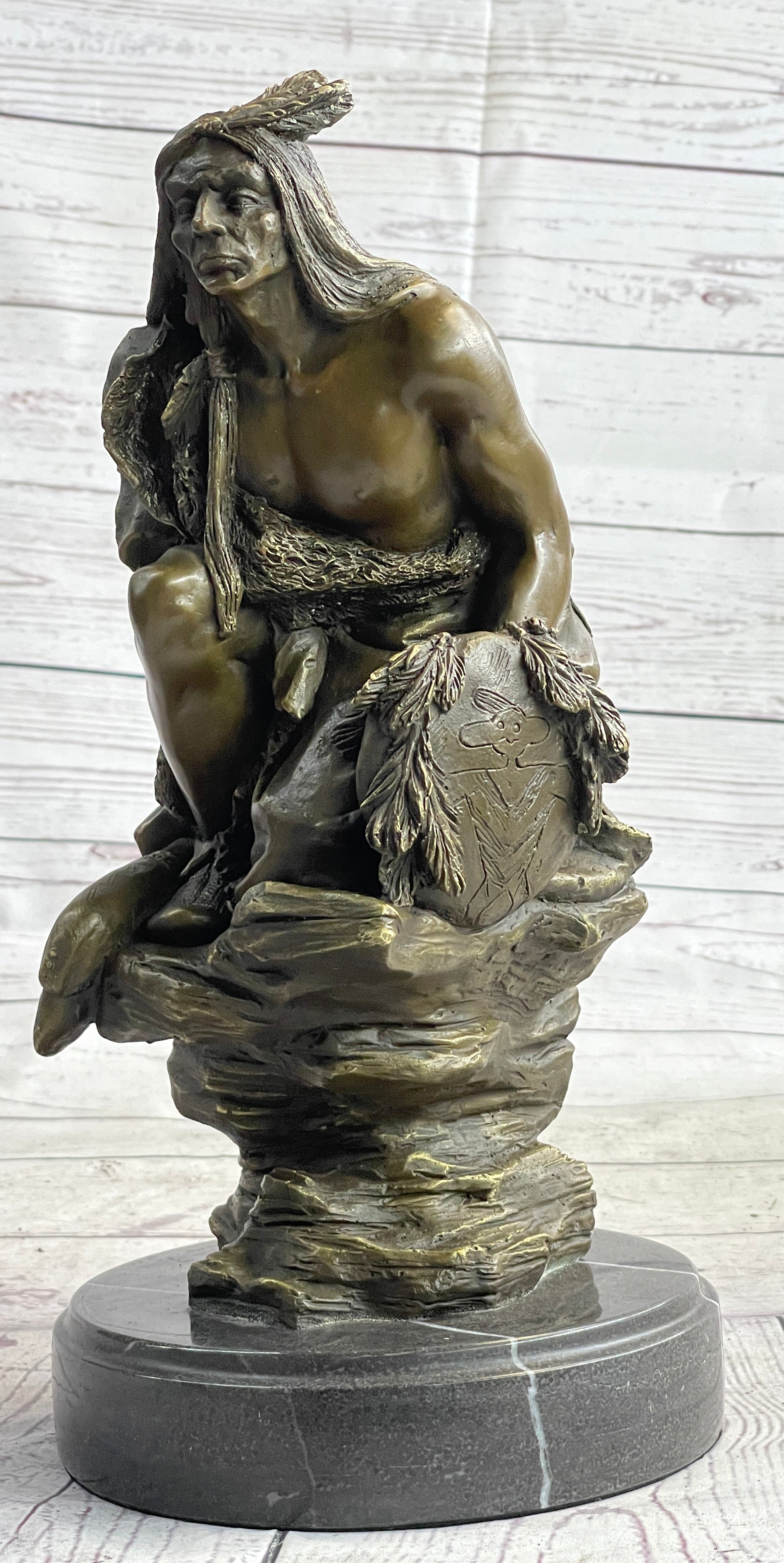 Native American Indian Warrior Squatting on Rock Bronze Sculpture