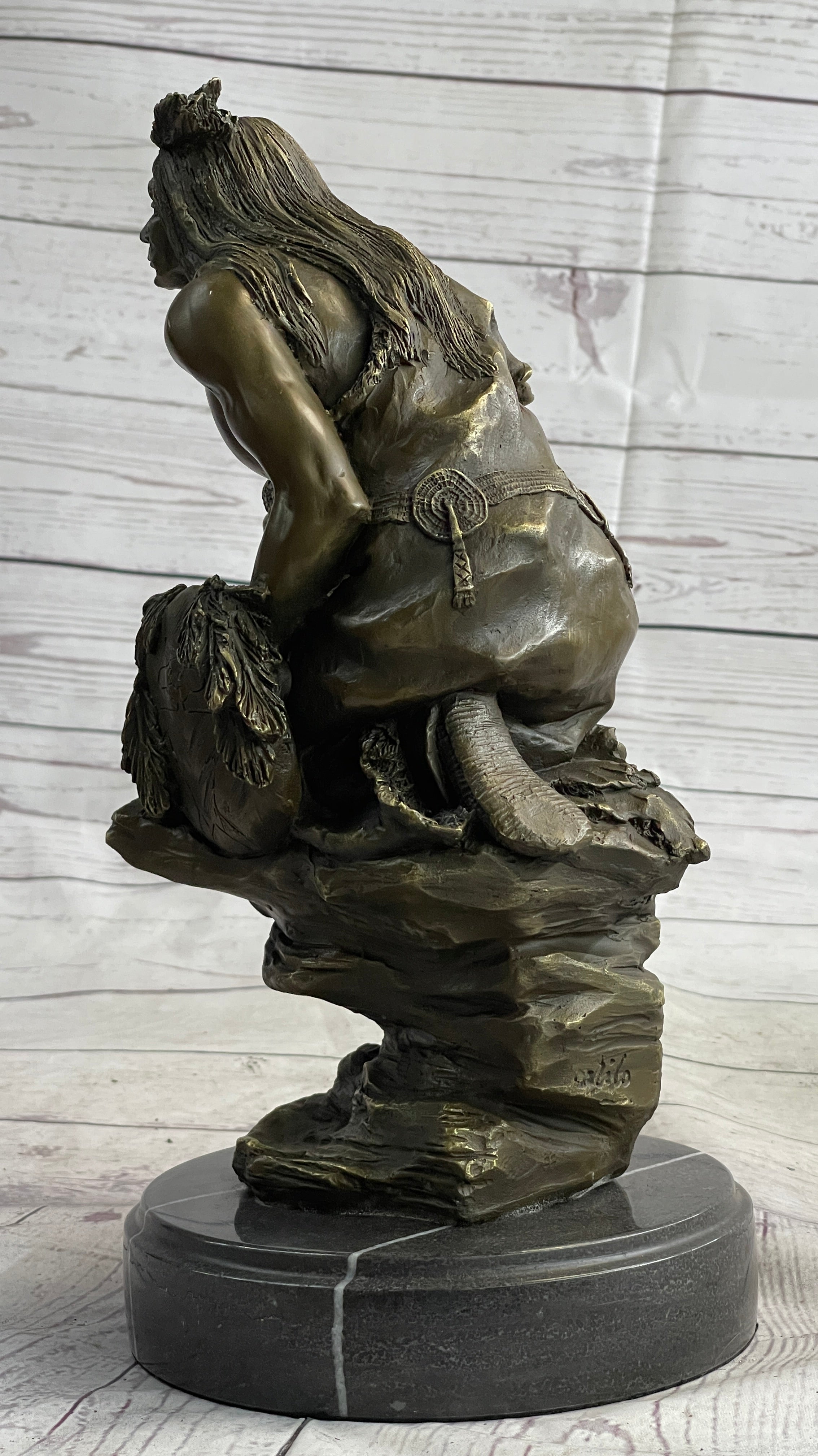 Native American Indian Warrior Squatting on Rock Bronze Sculpture
