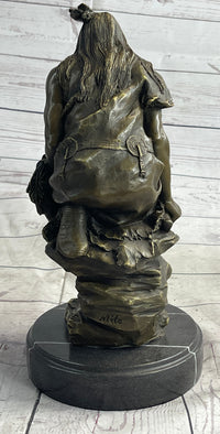 Native American Indian Warrior Squatting on Rock Bronze Sculpture