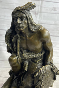 Native American Indian Warrior Squatting on Rock Bronze Sculpture