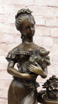 Victorian Edwardian Young Woman Holding Puppy - Bronze by Milo