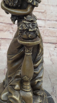 Victorian Edwardian Young Woman Holding Puppy - Bronze by Milo
