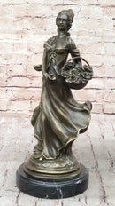Young Woman Carrying Basket of Flowers - Bronze Sculpture by Milo