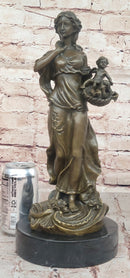 Bronze Mother and Child in Basket - Elegant Sculpture