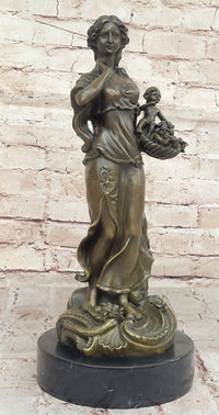 Bronze Mother and Child in Basket - Elegant Sculpture