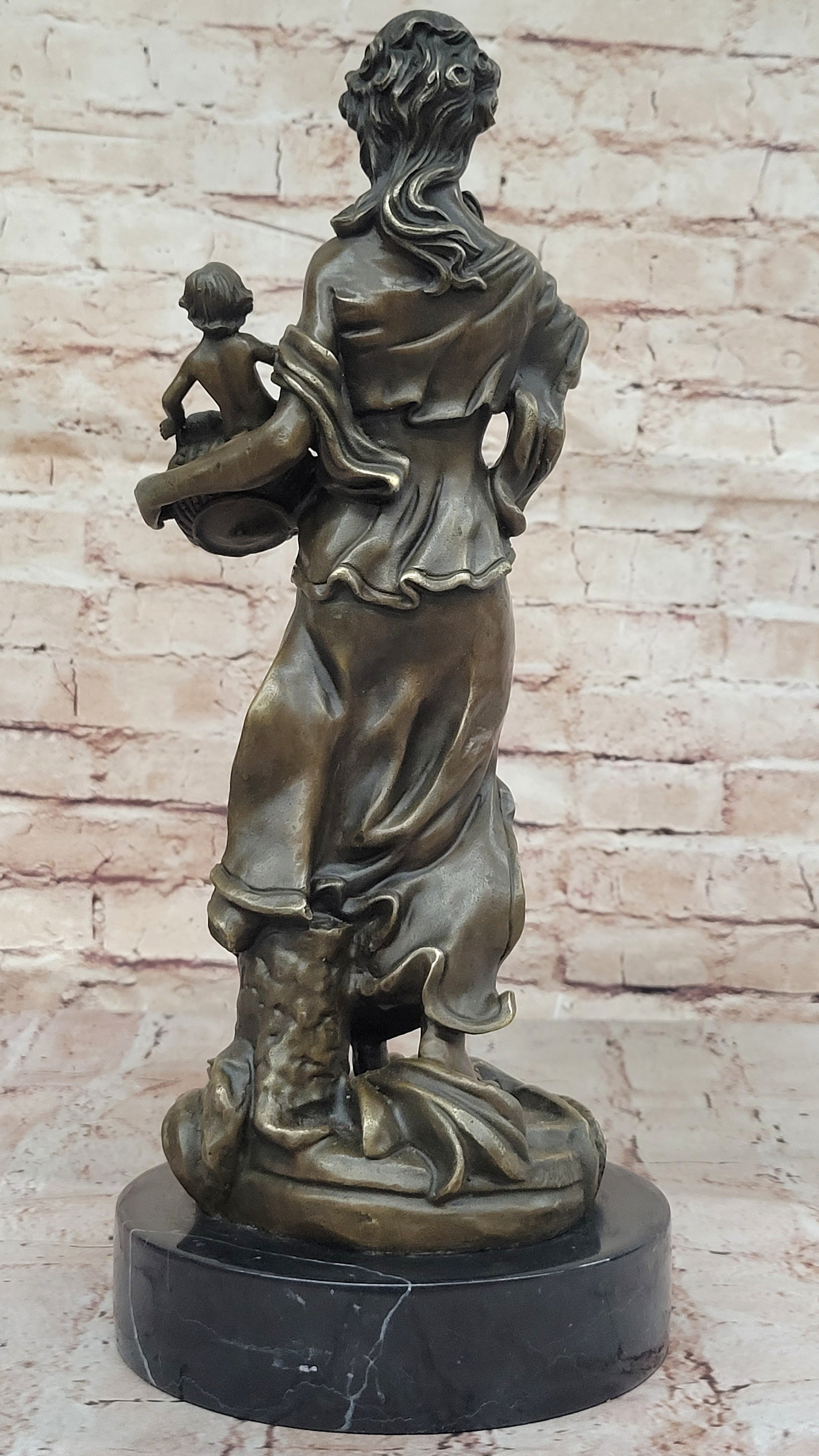 Bronze Mother and Child in Basket - Elegant Sculpture