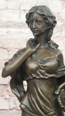 Bronze Mother and Child in Basket - Elegant Sculpture