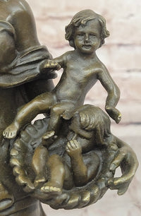 Bronze Mother and Child in Basket - Elegant Sculpture