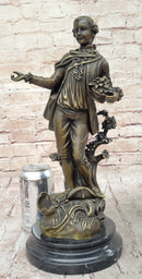 Colonial Era Man Holding Basket of Fruit - Bronze by Milo