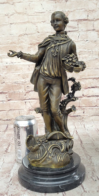 Colonial Era Man Holding Basket of Fruit - Bronze by Milo
