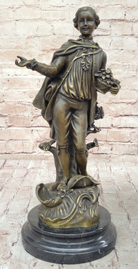 Colonial Era Man Holding Basket of Fruit - Bronze by Milo