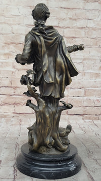 Colonial Era Man Holding Basket of Fruit - Bronze by Milo