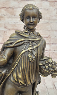 Colonial Era Man Holding Basket of Fruit - Bronze by Milo
