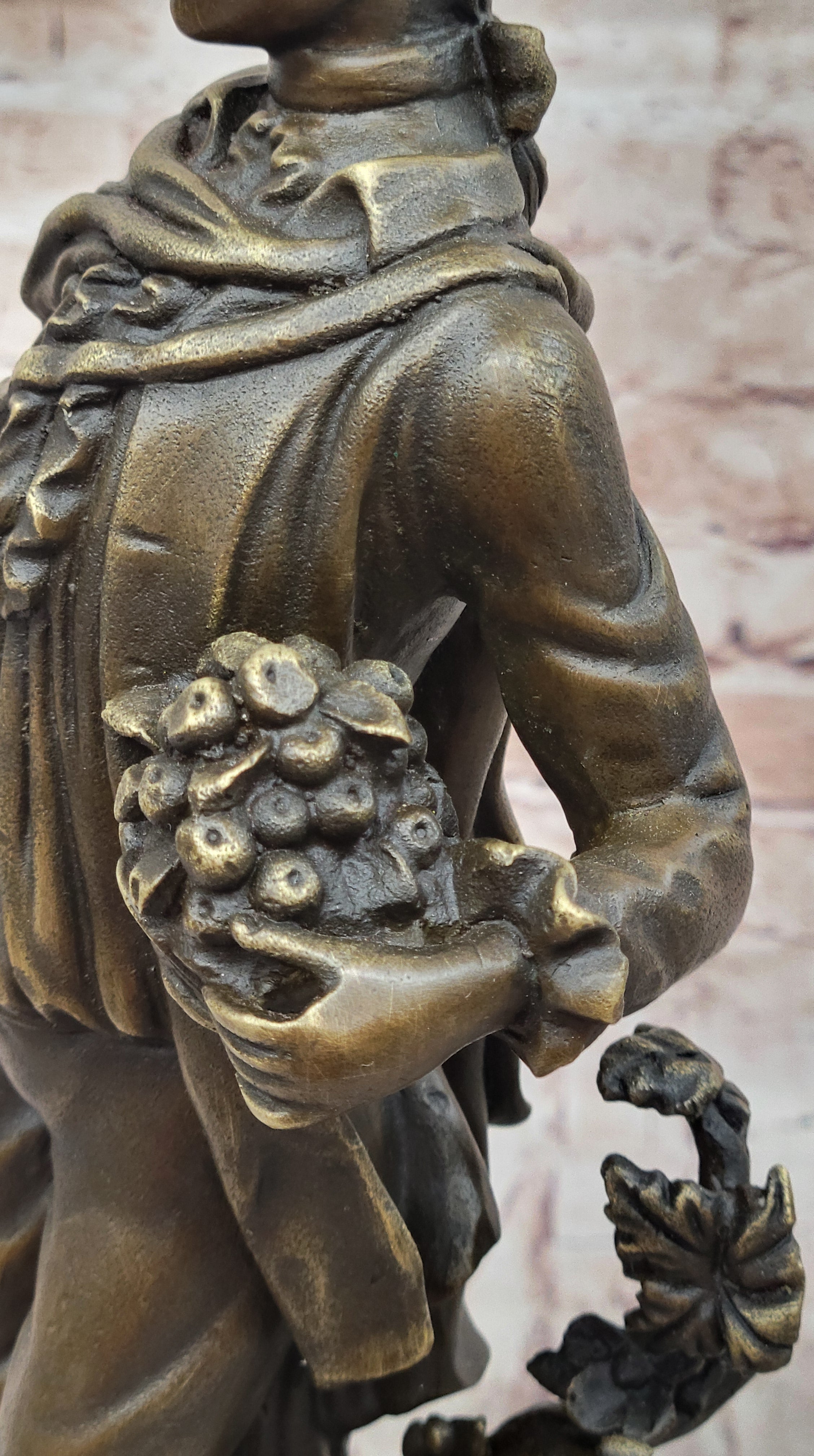 Colonial Era Man Holding Basket of Fruit - Bronze by Milo