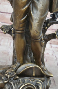 Colonial Era Man Holding Basket of Fruit - Bronze by Milo