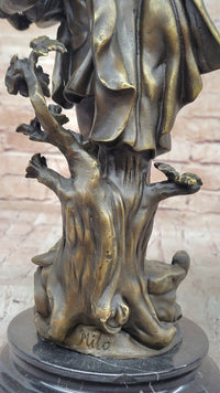Colonial Era Man Holding Basket of Fruit - Bronze by Milo