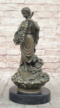Female Figure Holding a Floral Cornucopia - Bronze Sculpture by Milo