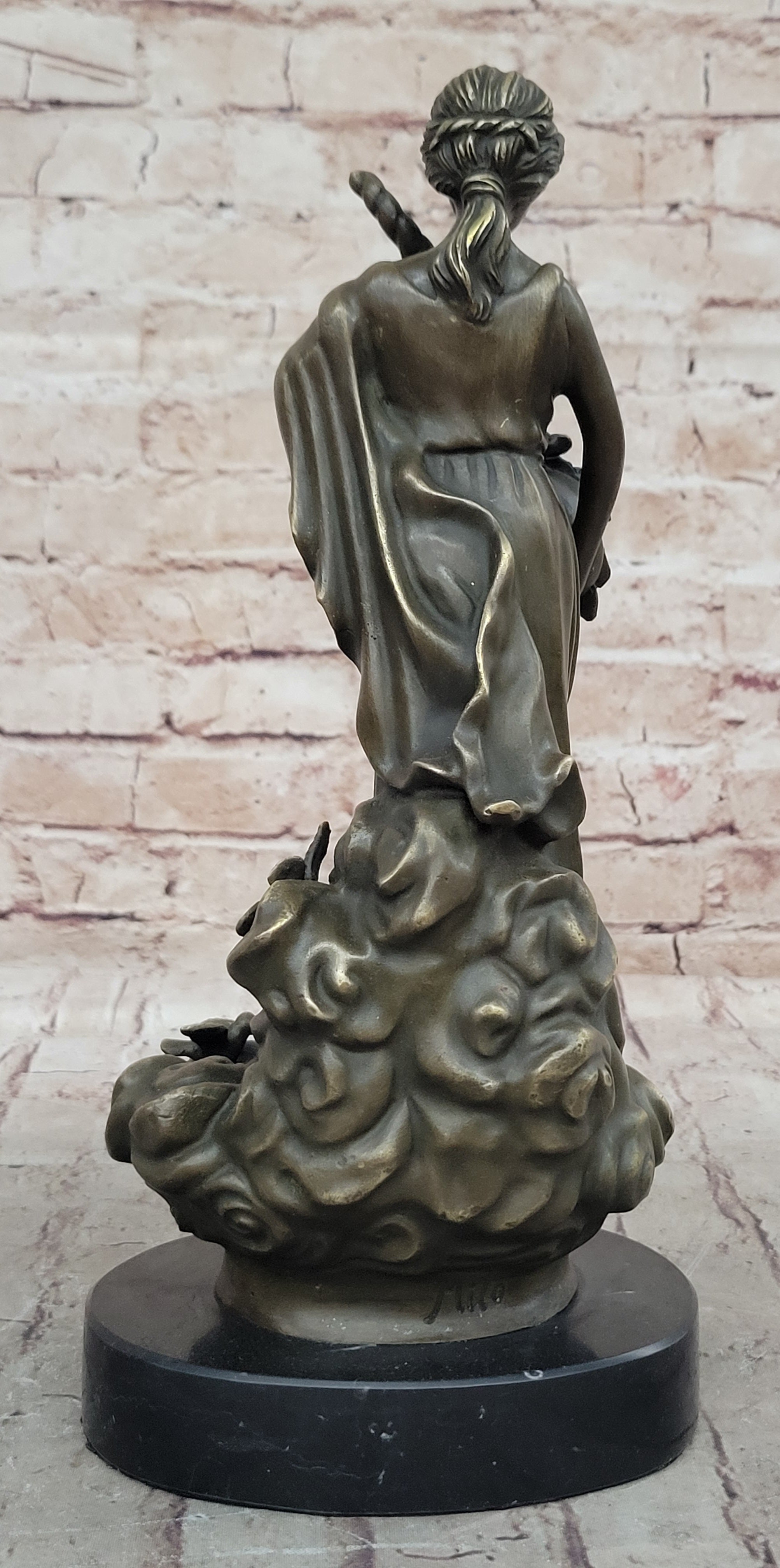 Female Figure Holding a Floral Cornucopia - Bronze Sculpture by Milo