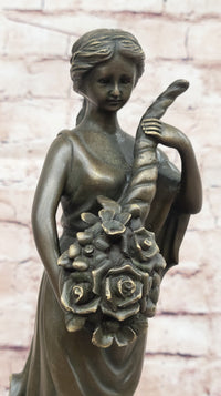 Female Figure Holding a Floral Cornucopia - Bronze Sculpture by Milo