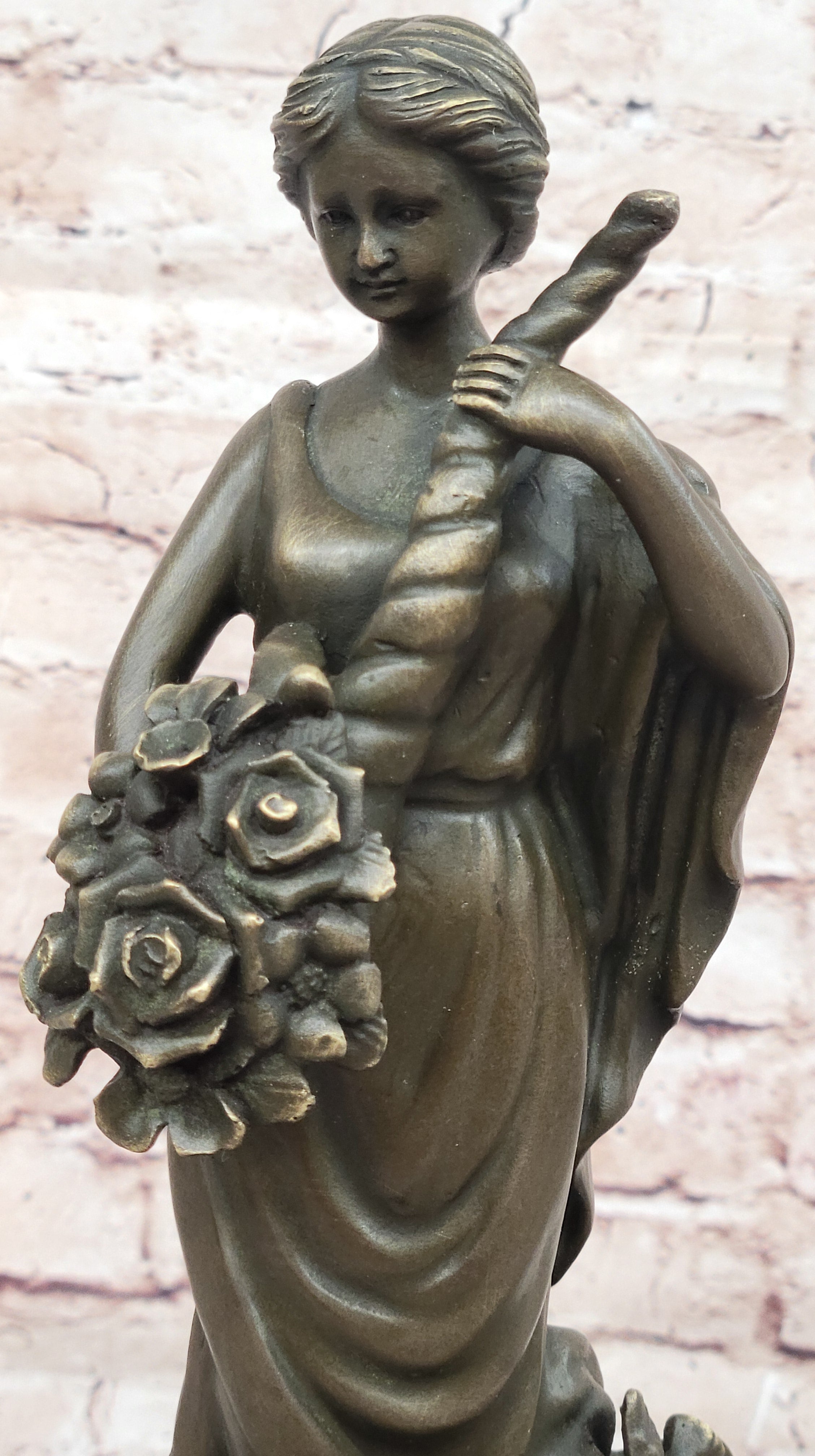 Female Figure Holding a Floral Cornucopia - Bronze Sculpture by Milo