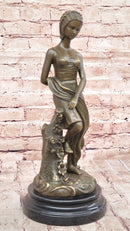 Young Girl Sitting on Tree Near Pond - Bronze Art by Milo