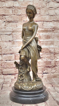 Young Girl Sitting on Tree Near Pond - Bronze Art by Milo