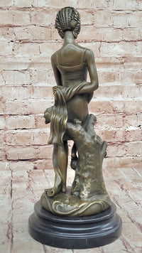 Young Girl Sitting on Tree Near Pond - Bronze Art by Milo